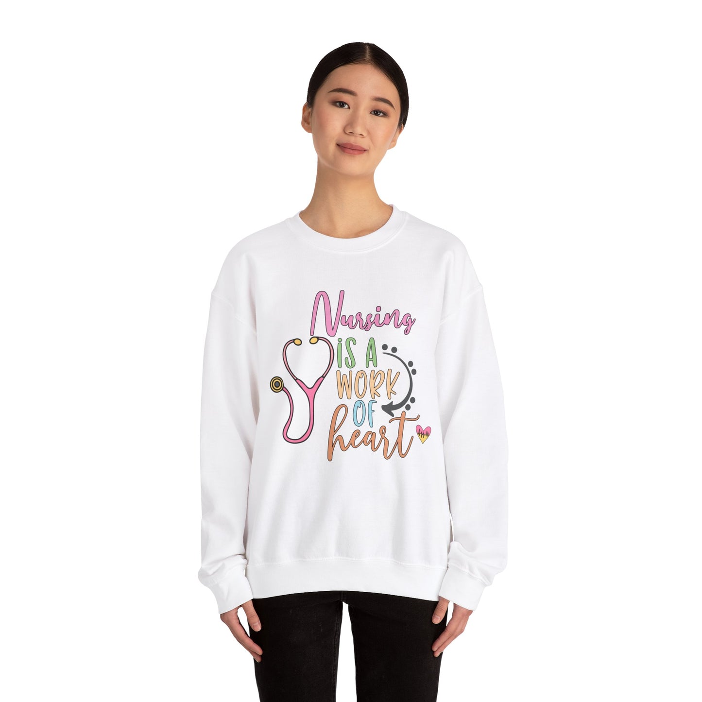 Nursing is a Work of Heart Crewneck Sweatshirt - Unisex Heavy Blend™